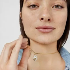 Colgante Acuario con baño de oro 18 kt sobre plata, nácar y topacios Horoscope^TOUS Hot