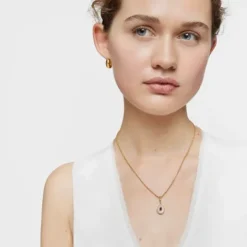 Colgante medalla con baño de oro de 18 kt sobre plata, nácar y amatista Medallions^TOUS Discount
