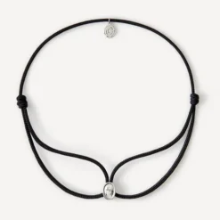 Pulsera de oro blanco con diamante y cordón negro ATELIER^TOUS New