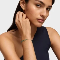 Pulsera elástica con baño de oro 18 kt sobre plata y gemas verdes Bold Bear^TOUS